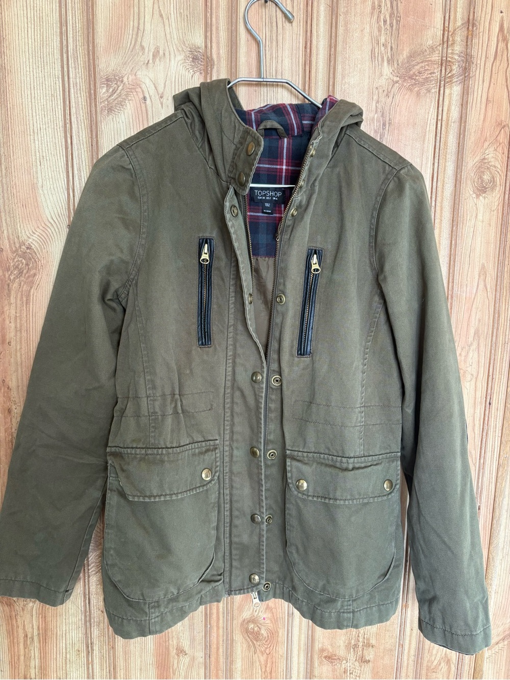 Topshop woman’s Olive Green Hooded Raincoat with Plaid Lining size 2